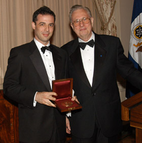 Photo of Dalton Conley, 2005 Waterman award winner, with NSF Director Arden Bement